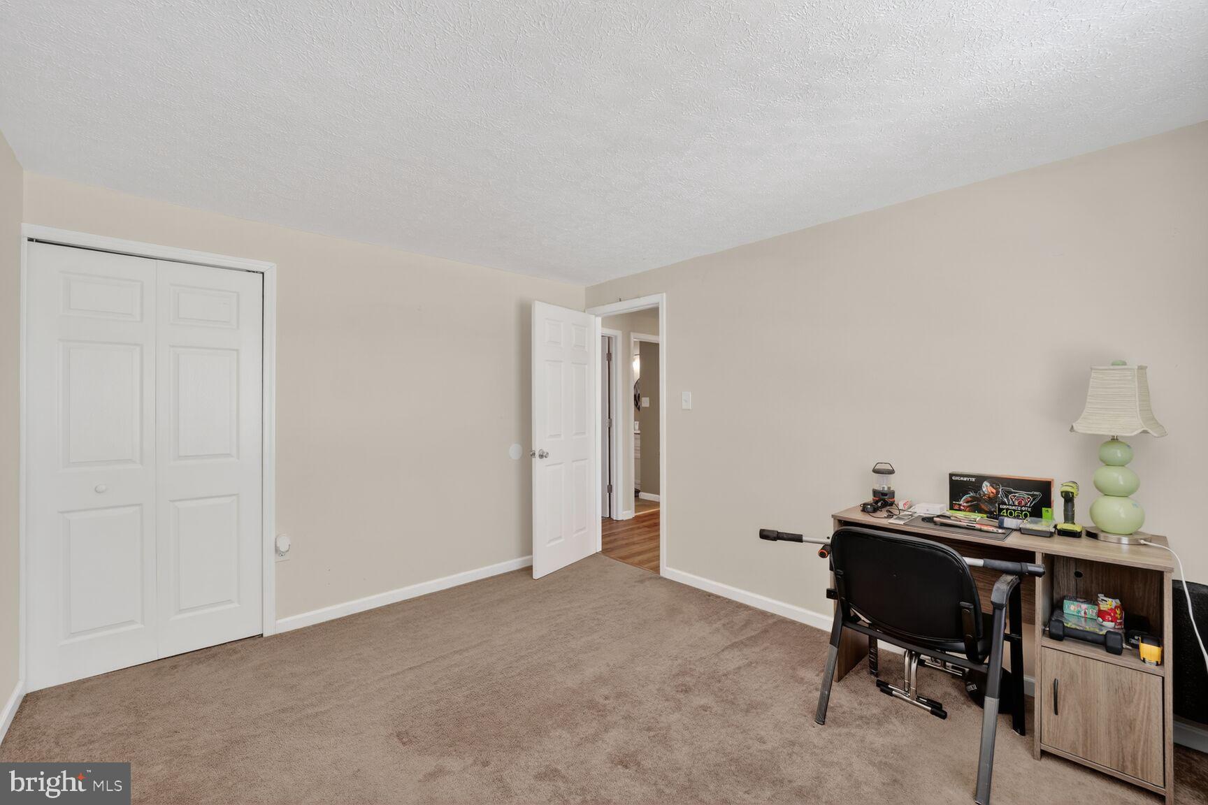 12611 Windbrook Drive Clinton, MD 20735 - Photo 17 of 32 a view of a workspace with furniture