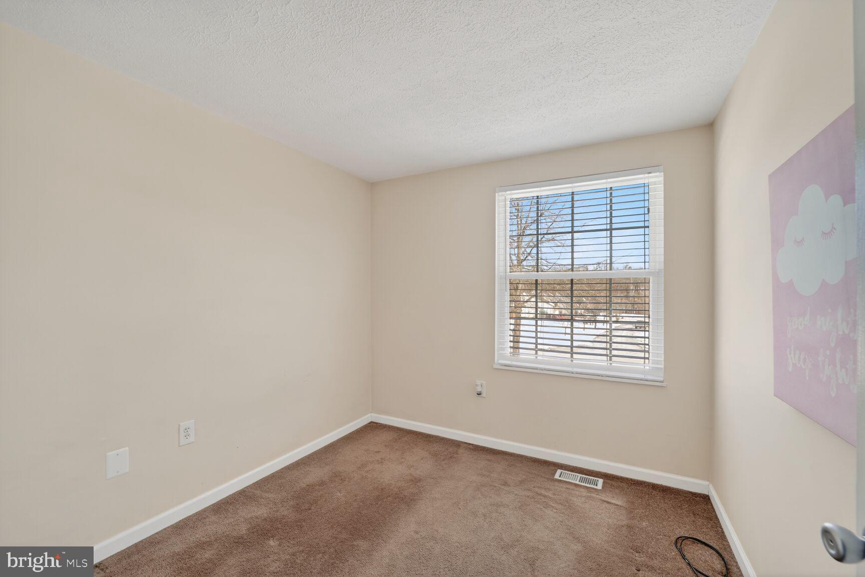 12611 Windbrook Drive Clinton, MD 20735 - Photo 18 of 32 an empty room with a window