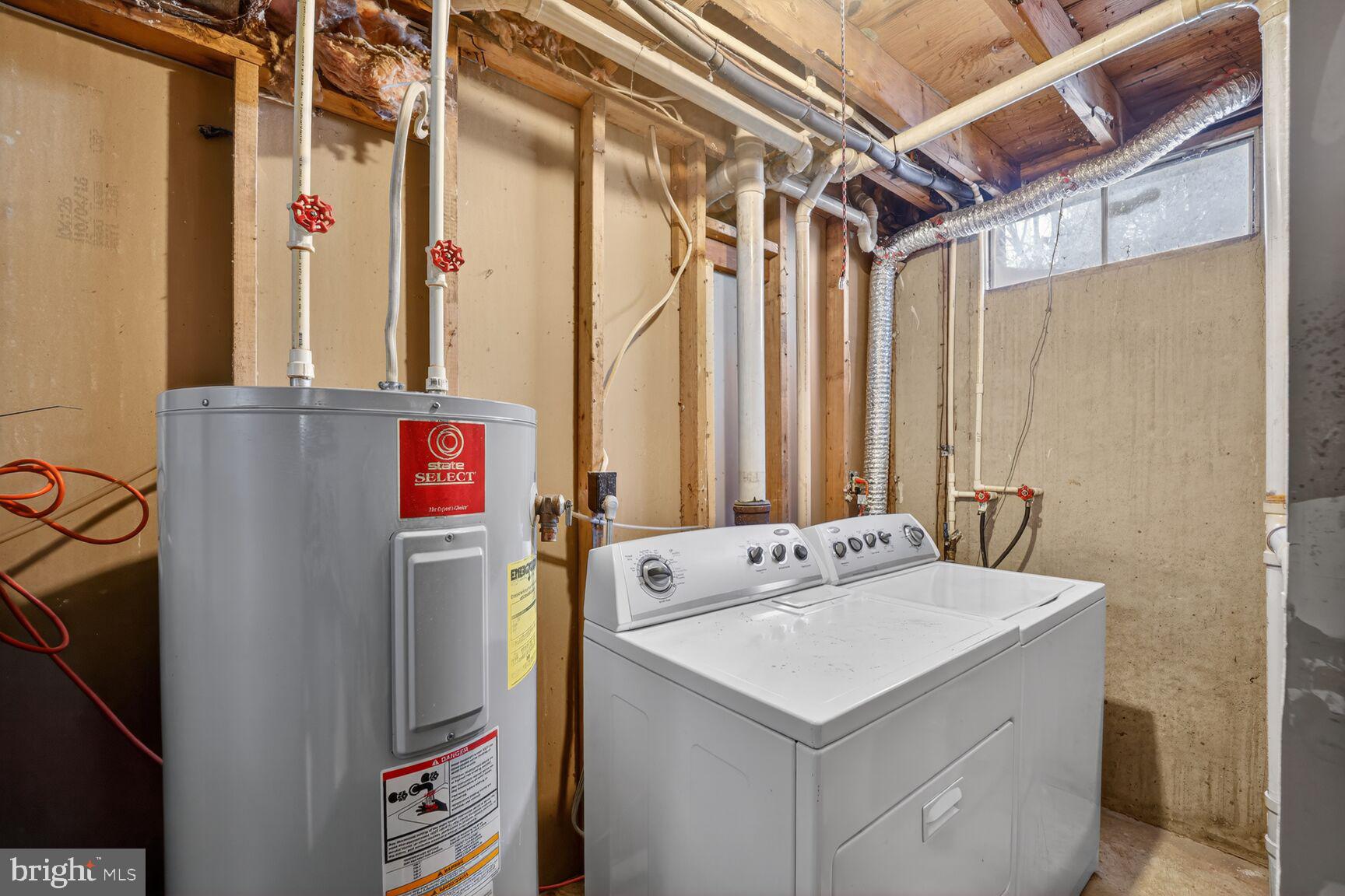 12611 Windbrook Drive Clinton, MD 20735 - Photo 25 of 32 a utility room with dryer and washer
