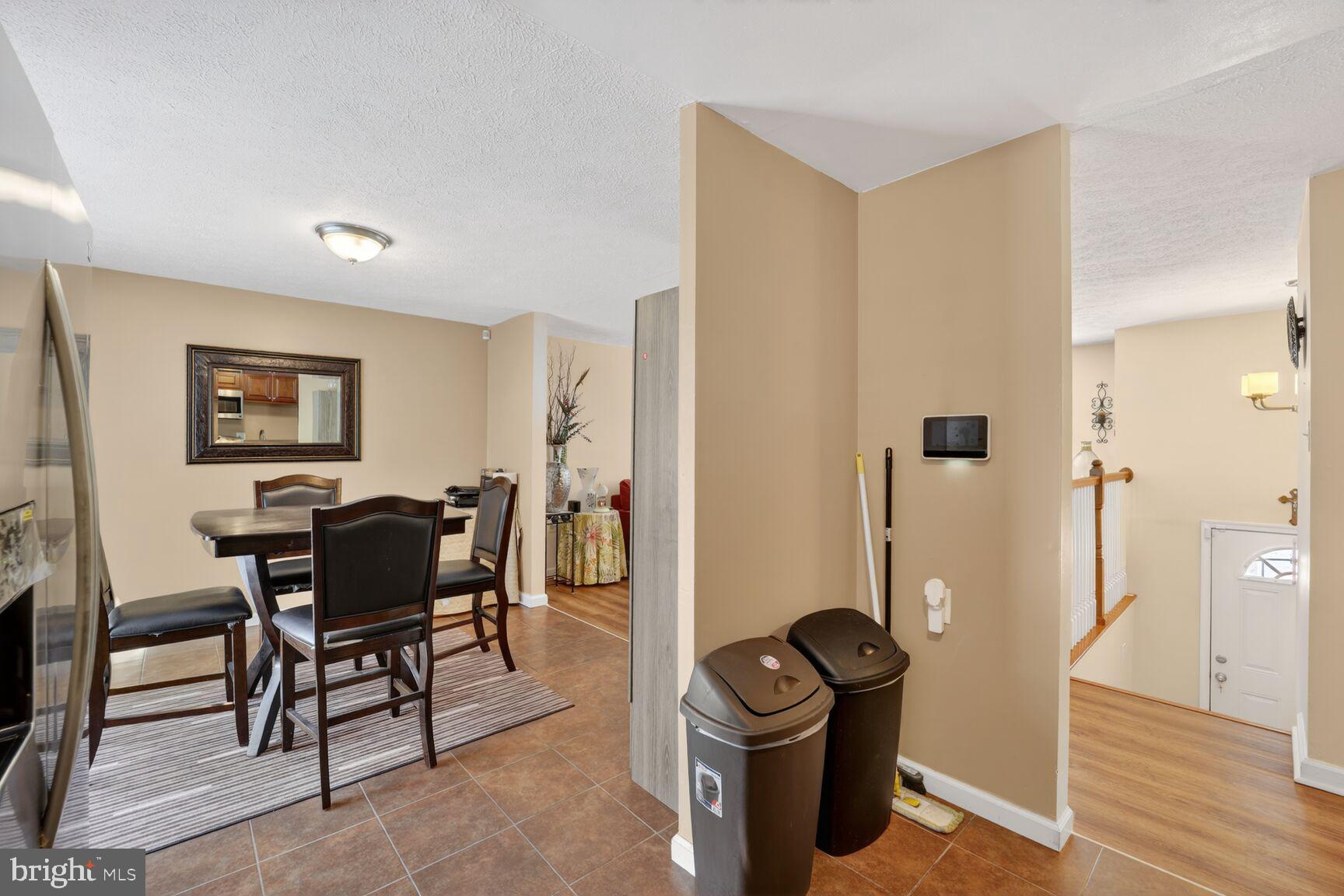 12611 Windbrook Drive Clinton, MD 20735 - Photo 10 of 32 a view of a workspace with furniture and a livingroom