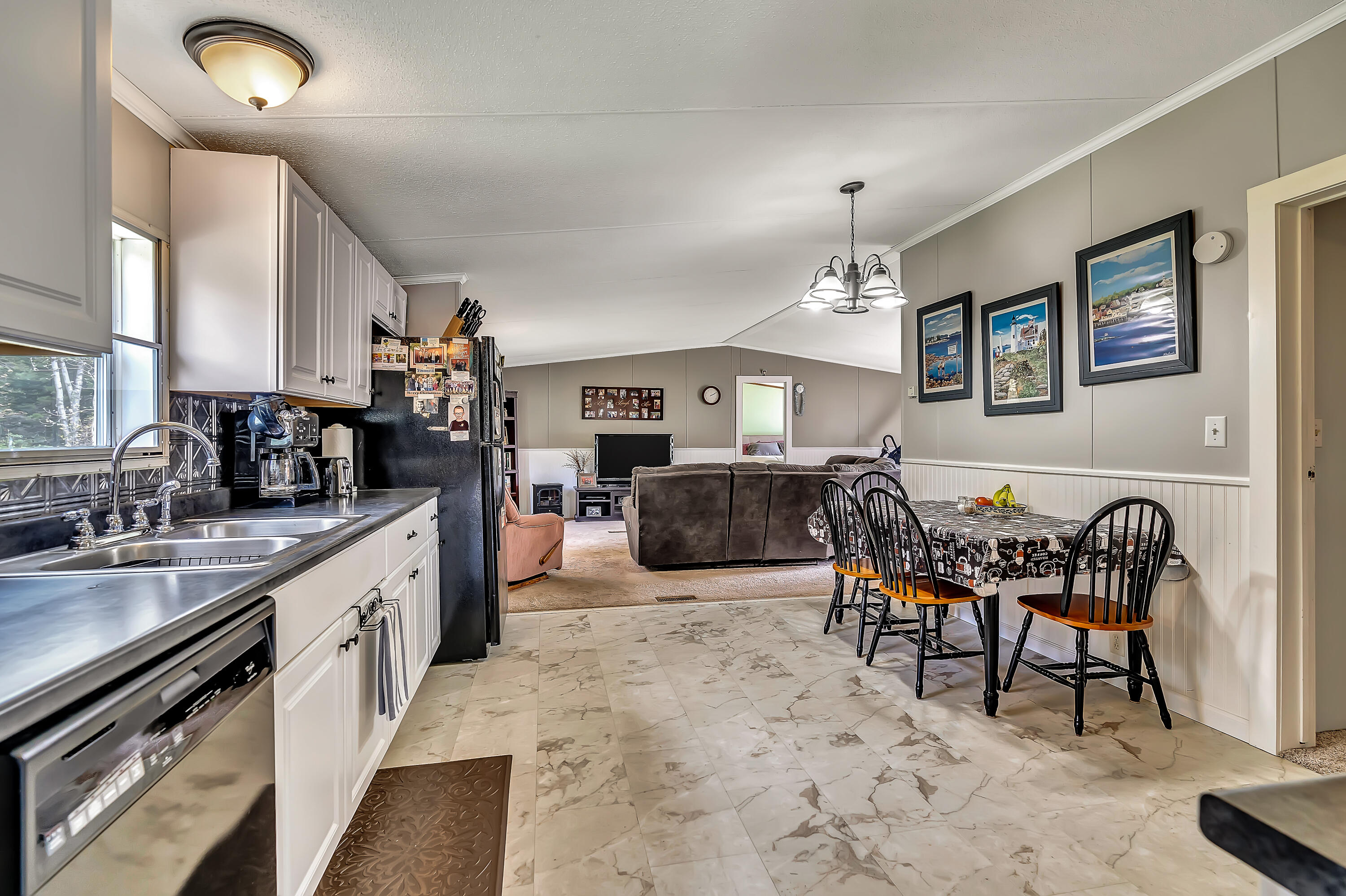 Walk in to laundry room and then kitchen
