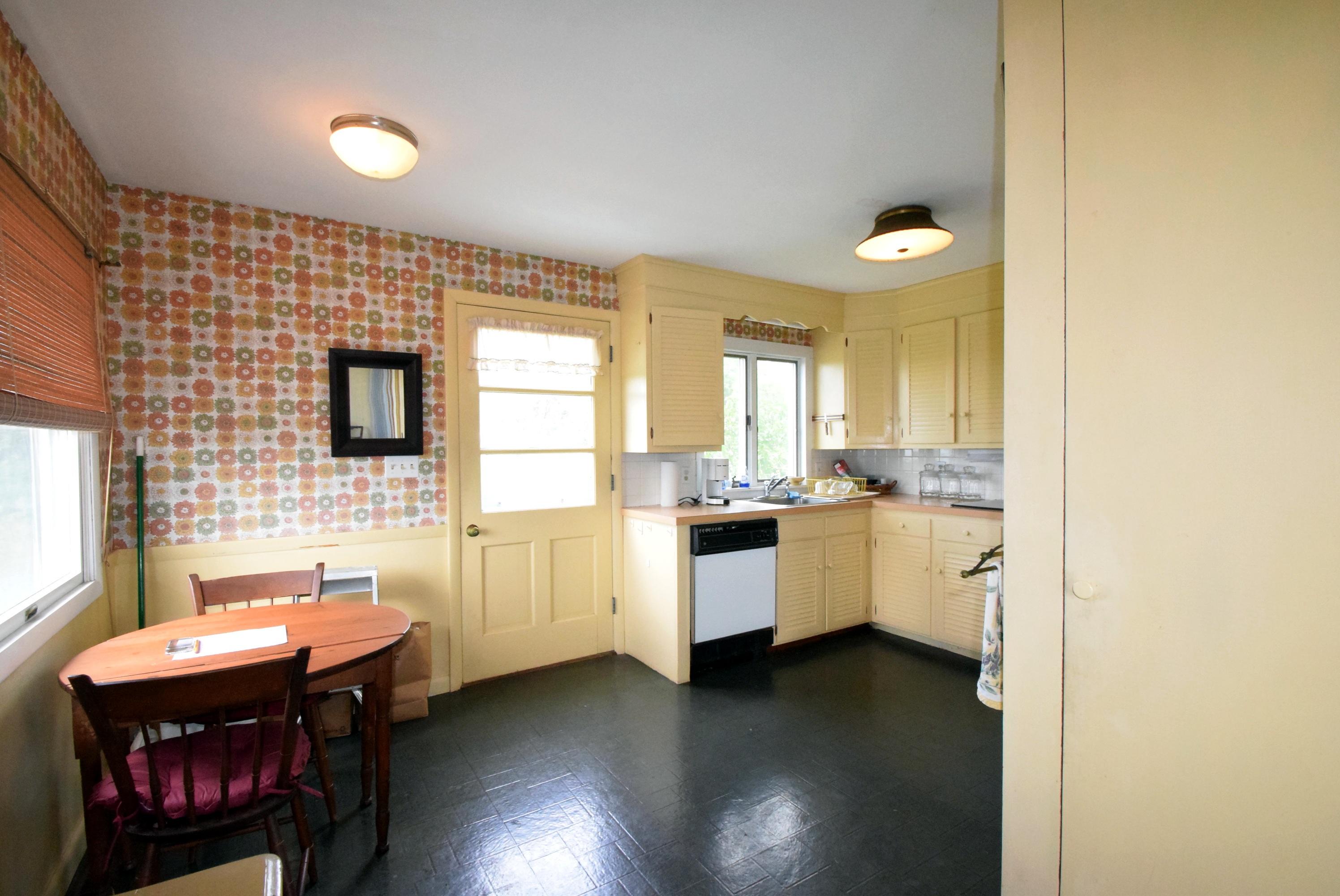 2 Ryder Hollow Road Truro, MA 02666 - Photo 19 of 31 a kitchen with a sink cabinets and wooden floor