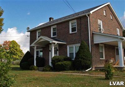 978 Bushkill Center Road Nazareth, PA 18064 - Photo 1 of 11 a front view of a house with a yard