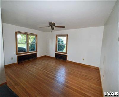 978 Bushkill Center Road Nazareth, PA 18064 - Photo 6 of 11 wooden floor in an empty room with a window