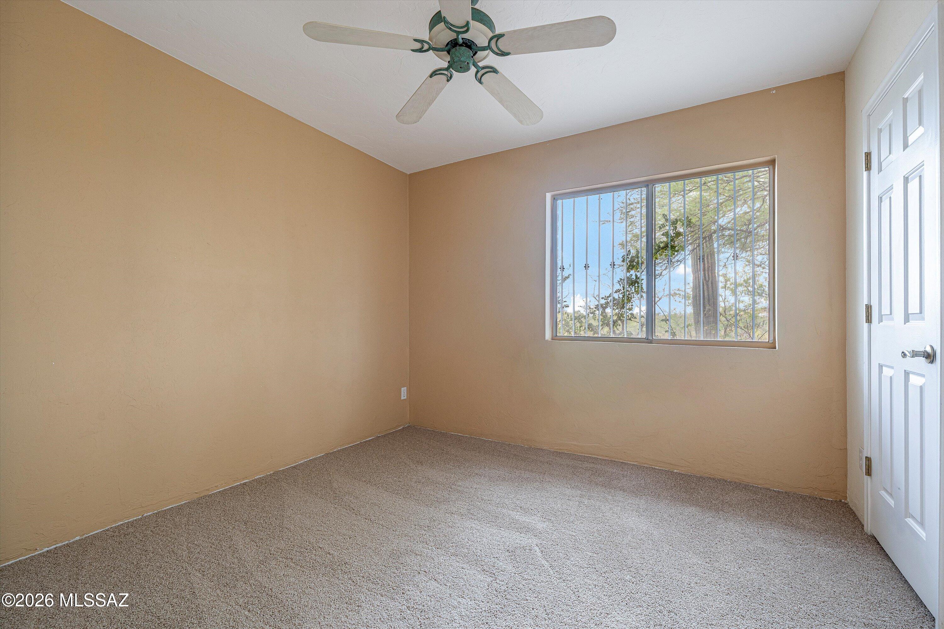 10961 East Roger Road Tucson, AZ 85749 - Photo 42 of 45 3rd bedroom overlooking front of property