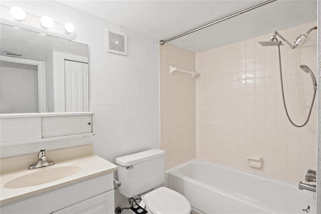 920 Lake Destiny Road, Unit F Altamonte Springs, FL 32714 - Photo 11 of 27 a bathroom with a sink toilet and shower