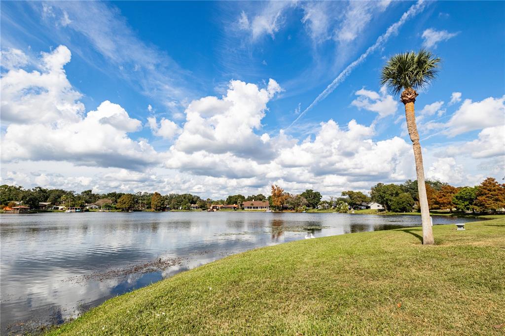 920 Lake Destiny Road, Unit F Altamonte Springs, FL 32714 - Photo 23 of 27 a view of a lake with houses in the back