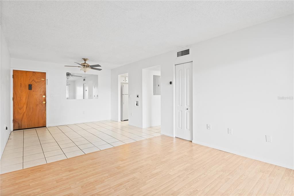 920 Lake Destiny Road, Unit F Altamonte Springs, FL 32714 - Photo 4 of 27 a view of a room with wooden floor and windows