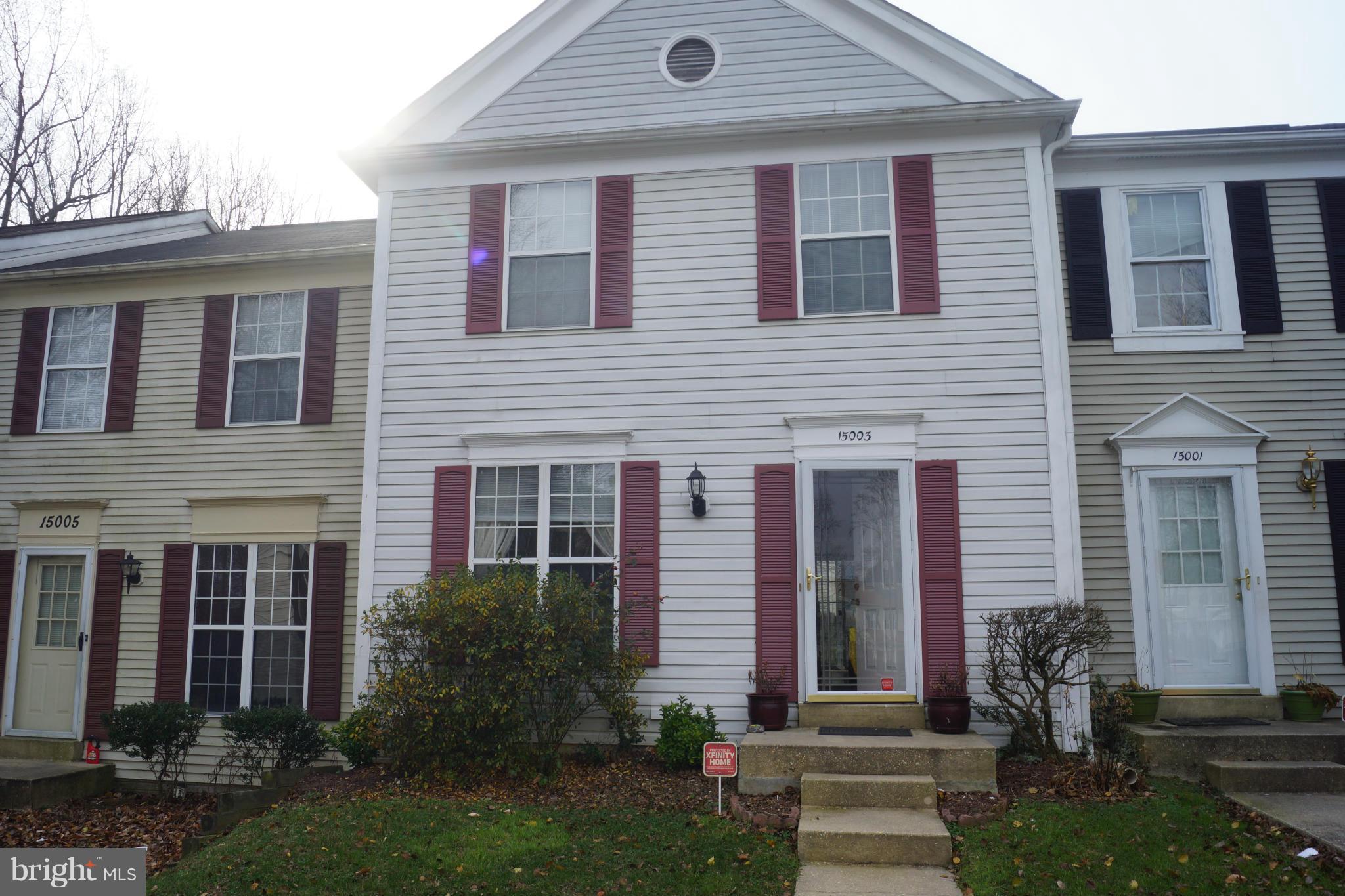 15003 Travert Way Silver Spring, MD 20906 - Photo 1 of 14 a front view of a house with a yard