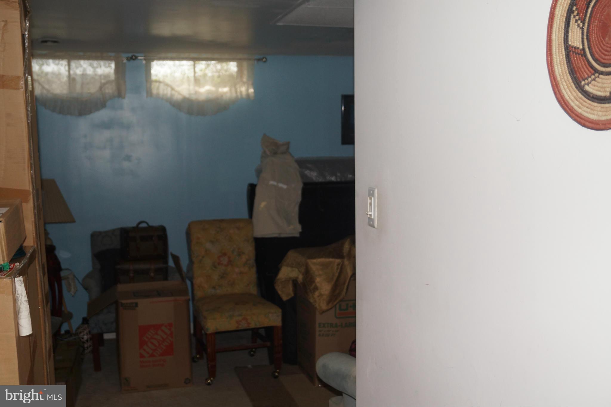 15003 Travert Way Silver Spring, MD 20906 - Photo 6 of 14 a view of a room with furniture and chandelier