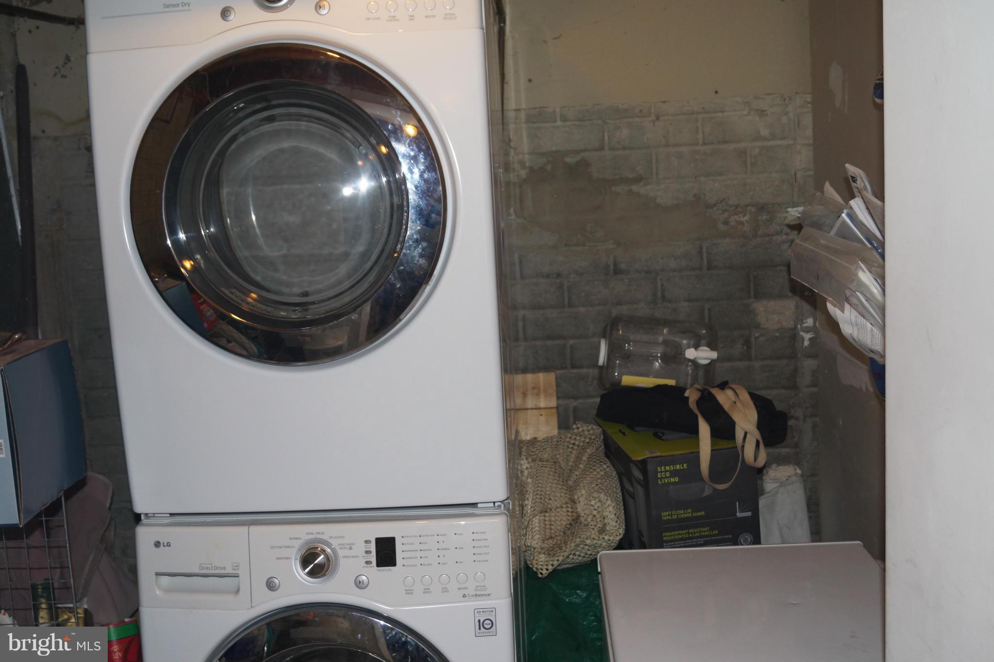 15003 Travert Way Silver Spring, MD 20906 - Photo 7 of 14 a utility room with dryer and washer
