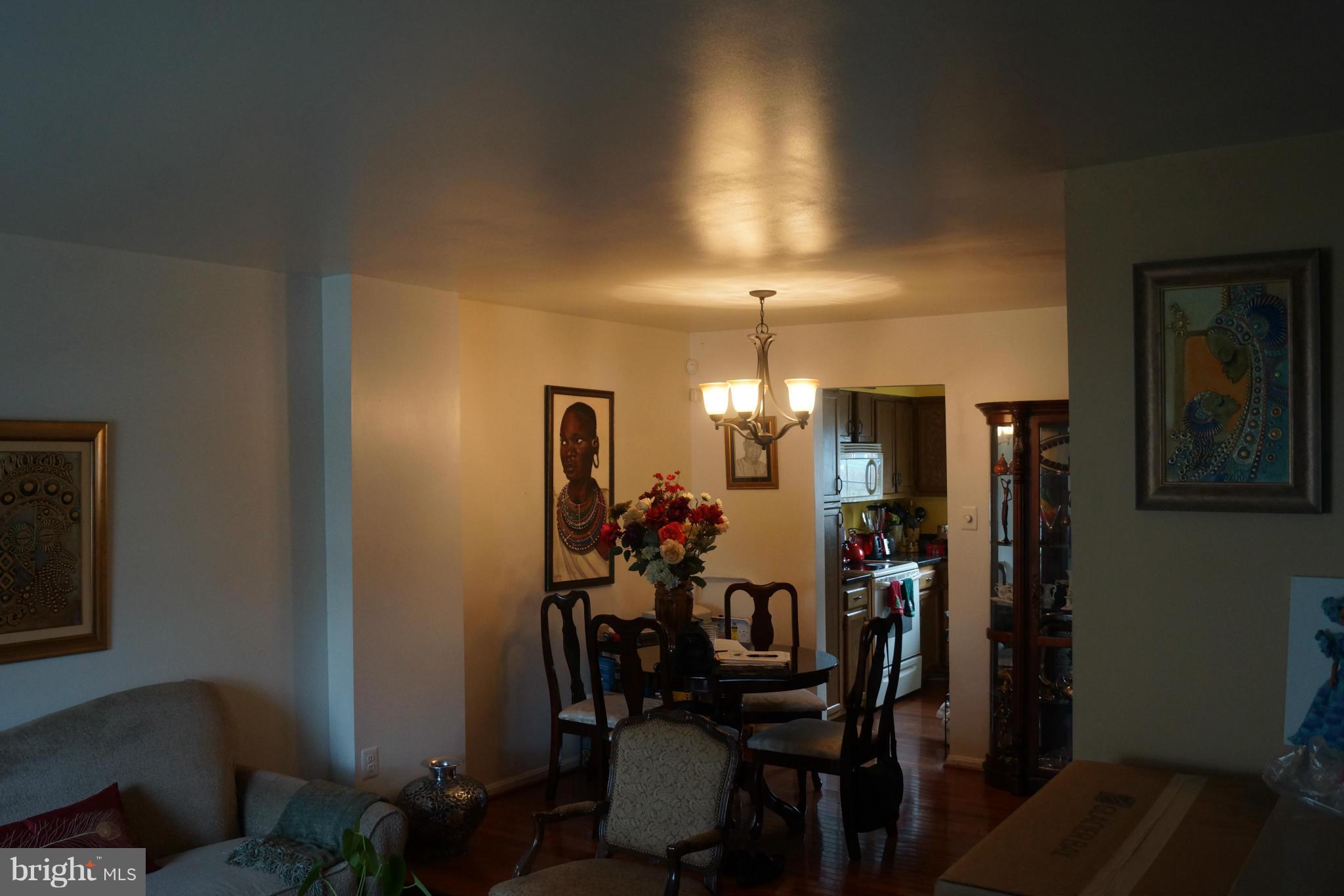 15003 Travert Way Silver Spring, MD 20906 - Photo 8 of 14 a view of a dining room with furniture
