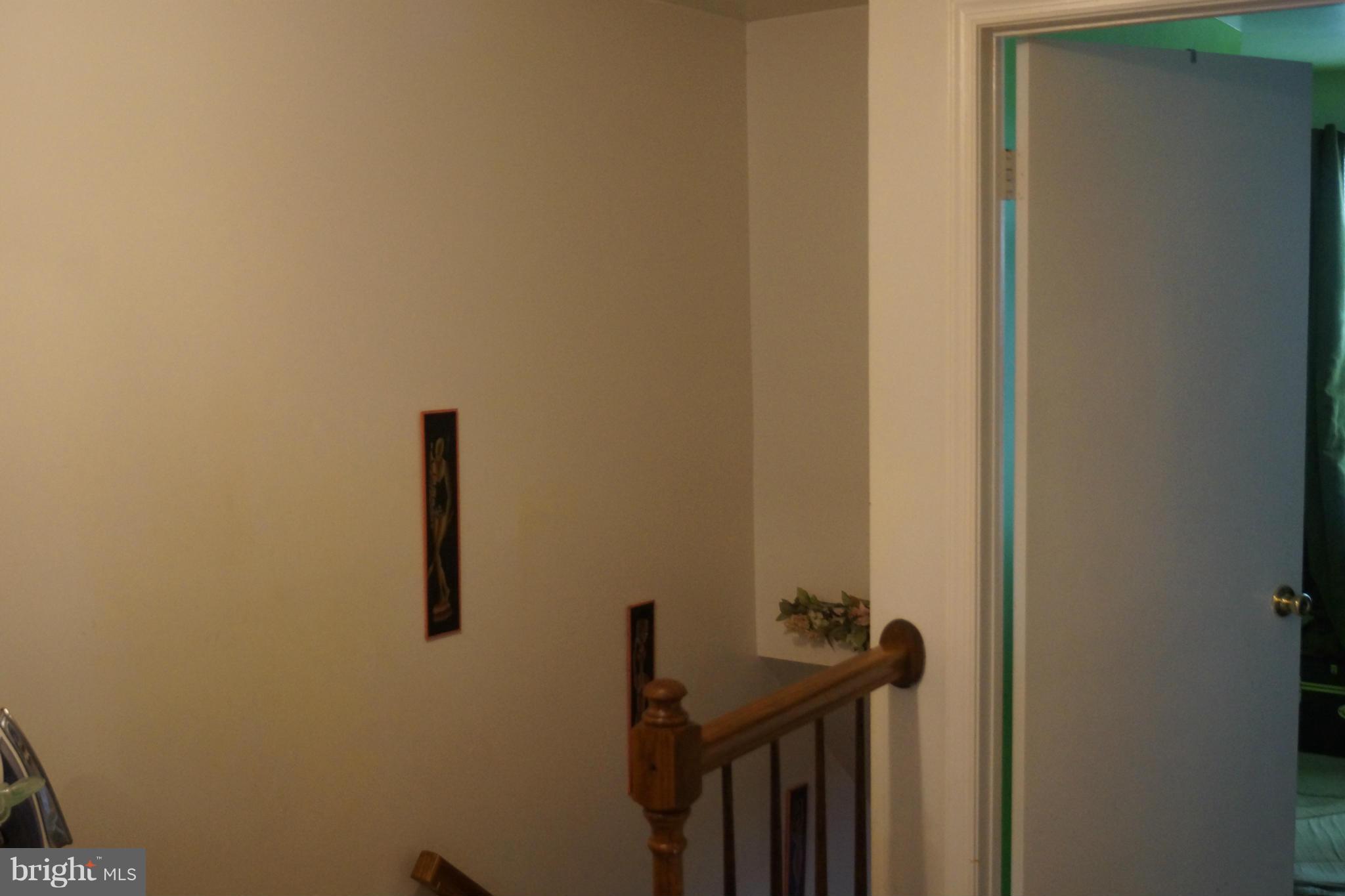 15003 Travert Way Silver Spring, MD 20906 - Photo 10 of 14 a view of a hallway with a small space