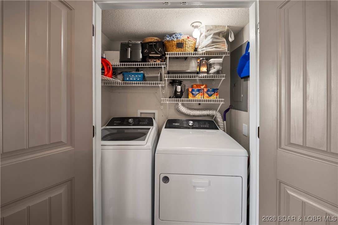 2500 Bay Point Lane, Unit 721 Osage Beach, MO 65065 - Photo 26 of 45 Laundry Closet off the Kitchen