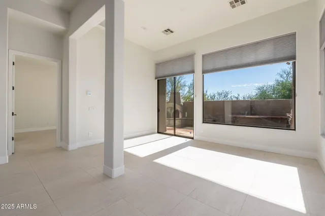 a view of a room with a large window
