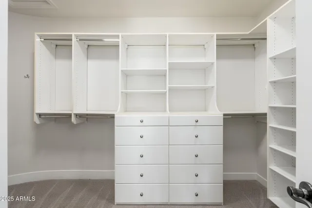 a view of an empty walk in closet