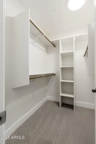 a view of an empty walk in closet