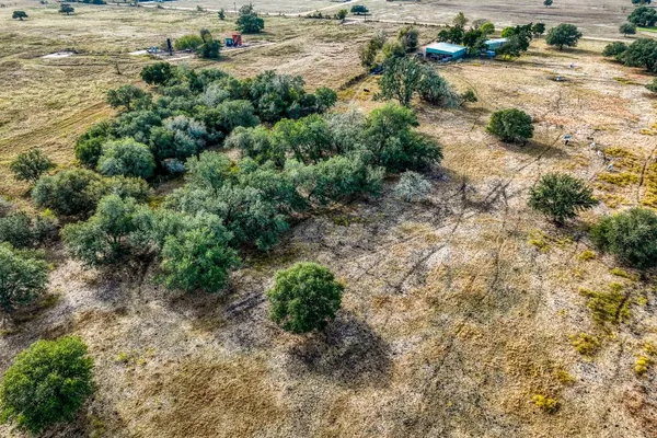 a view of a road with a yard