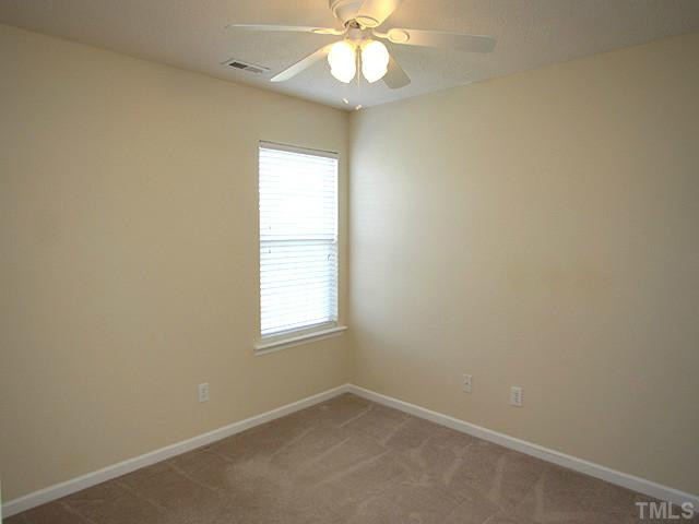 5518 Golden Moss Trail Raleigh, NC 27613 - Photo 9 of 13 Another first floor bedroom, could serve as a nice office space. Bedroom