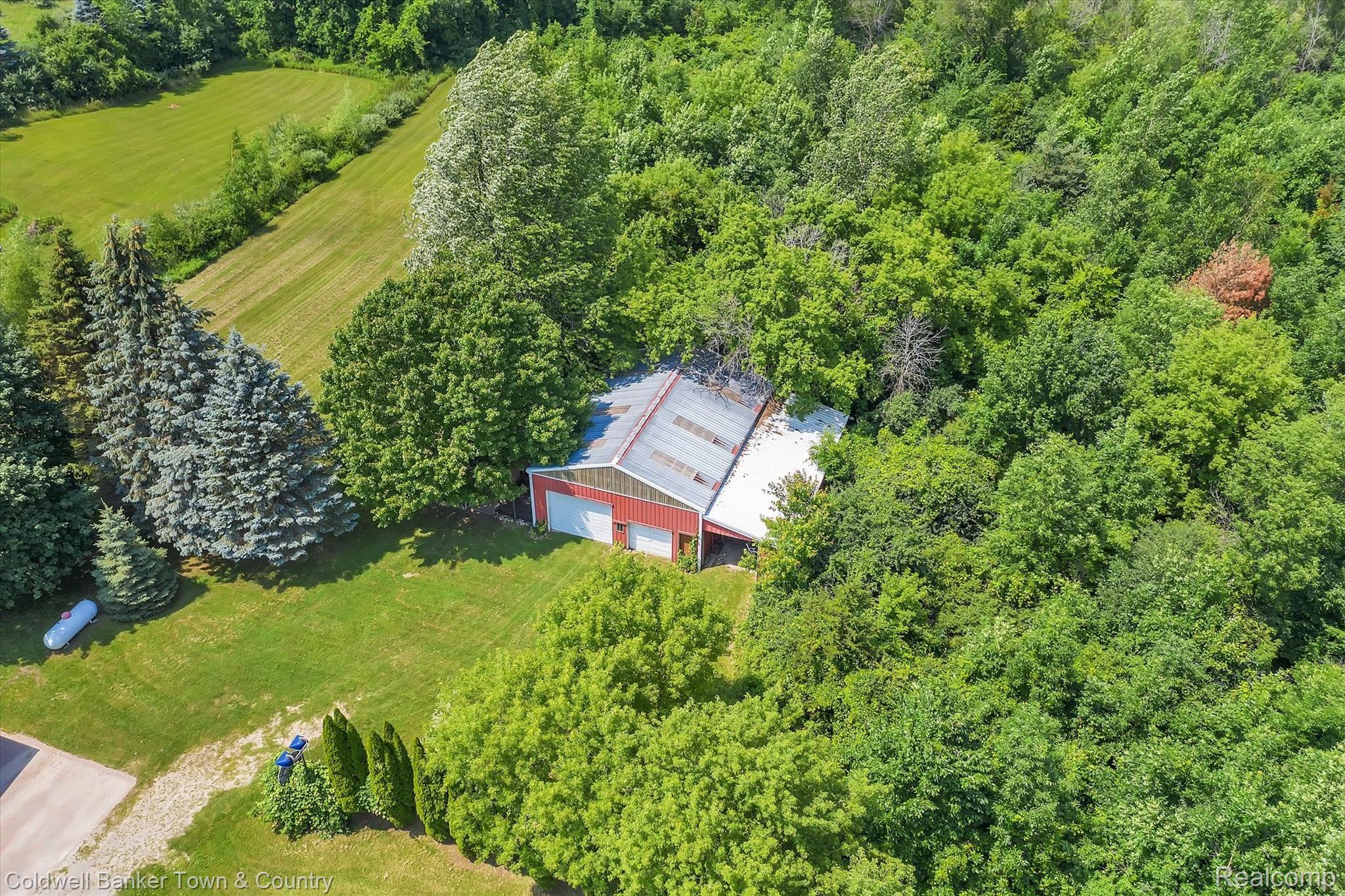 5431 Evans Road Holly, MI 48442 - Photo 71 of 81 Views of Pole Barn and woods from sky