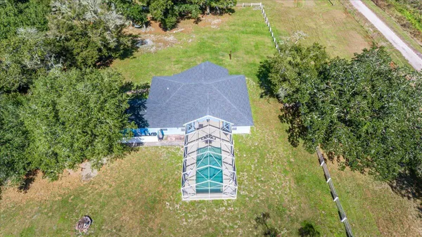 a view of a house with a swimming pool