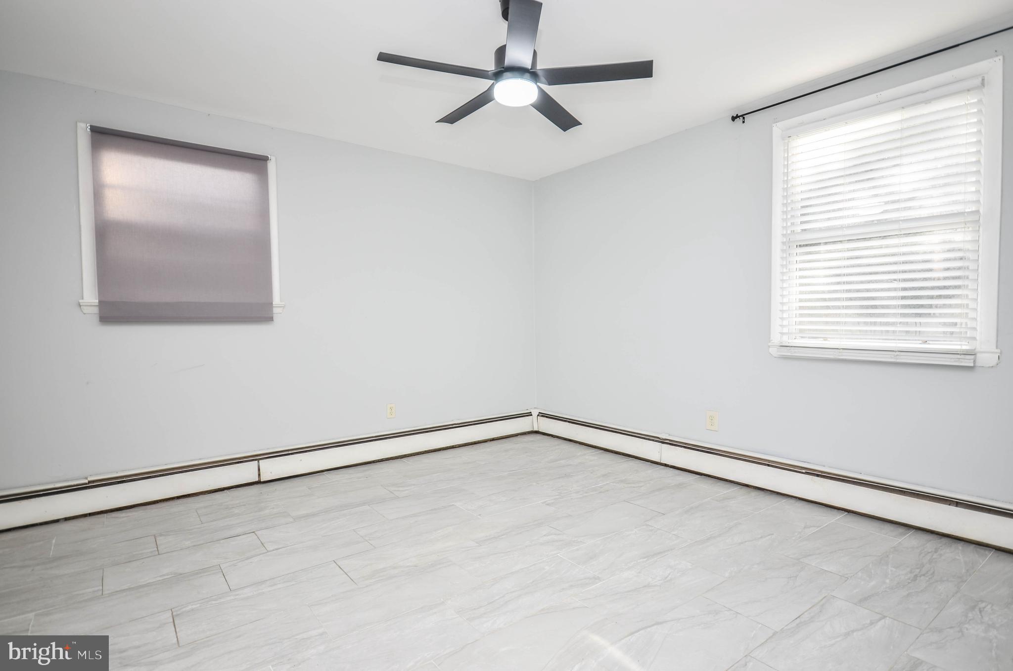 9801 Belhaven Road Bethesda, MD 20817 - Photo 25 of 32 a view of an empty room with a window