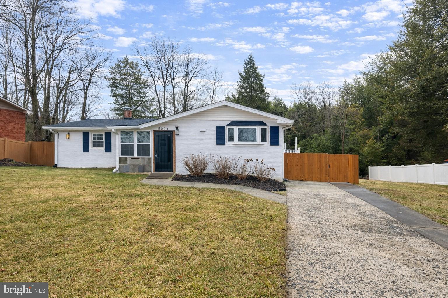 9801 Belhaven Road Bethesda, MD 20817 - Photo 32 of 32 a view of a house with a yard