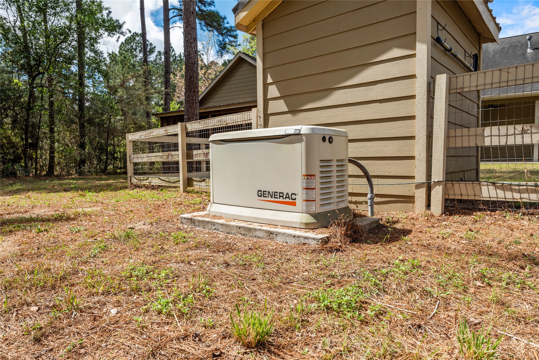 12062 Ike White Road Conroe, TX 77303 - Photo 34 of 37 Whole-home generator.