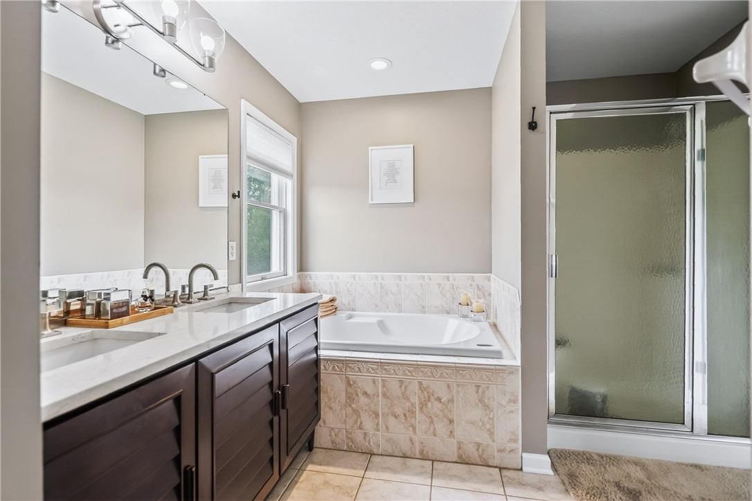 908 Taylor Rise Victor, NY 14564 - Photo 25 of 41 Primary Bath with Jetted Tub. (Walk in Closet too!