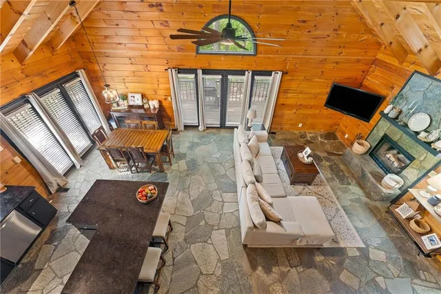 an aerial view of a house with swimming pool