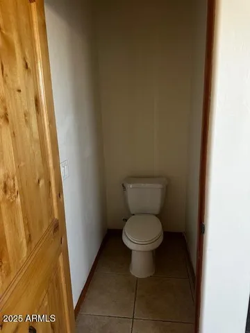 a bathroom with a toilet and a sink