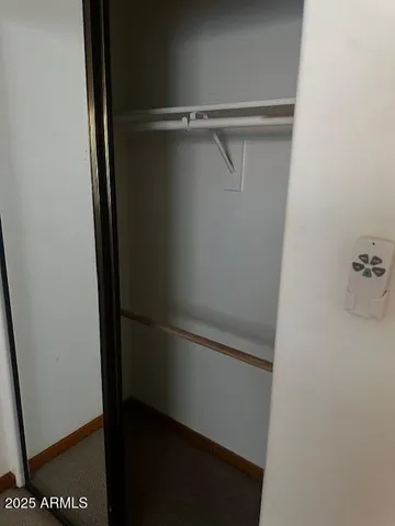 a view of a room that has a window in it