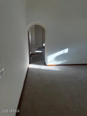 a view of a livingroom with wooden floor
