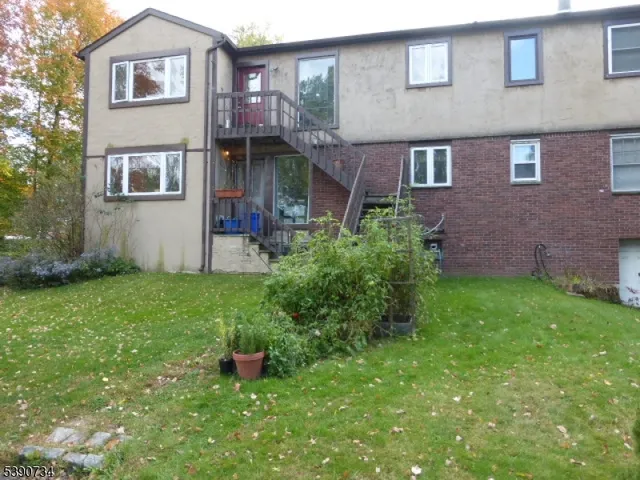 a view of a bench in a garden