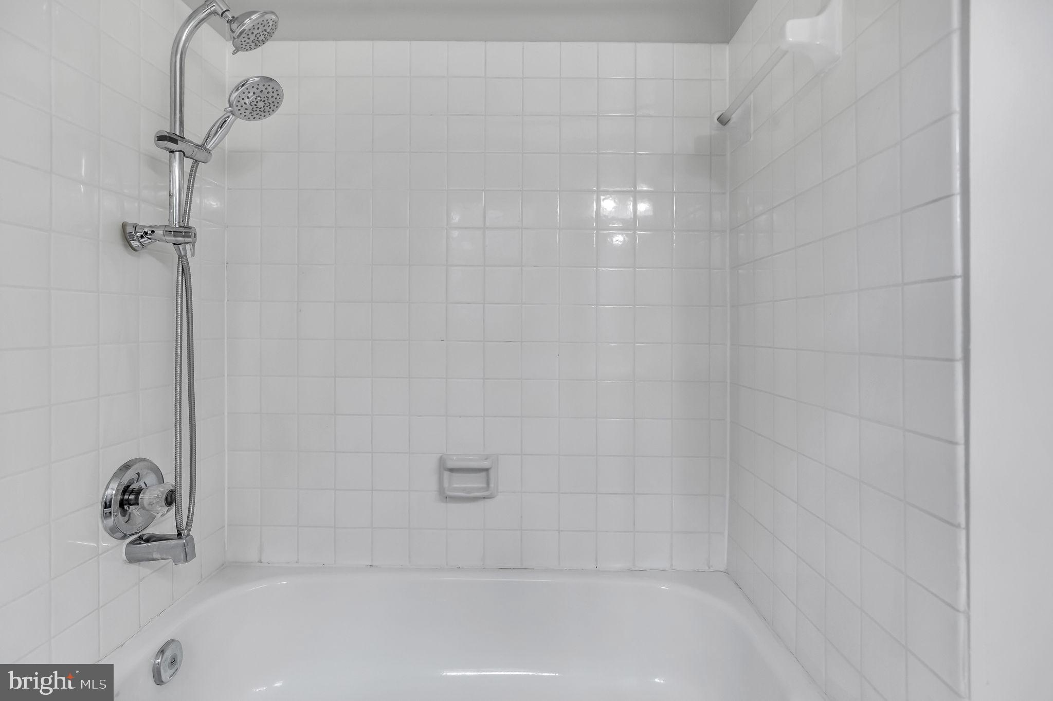 8914 Grandstaff Court Springfield, VA 22153 - Photo 28 of 48 a bathroom with a bathtub