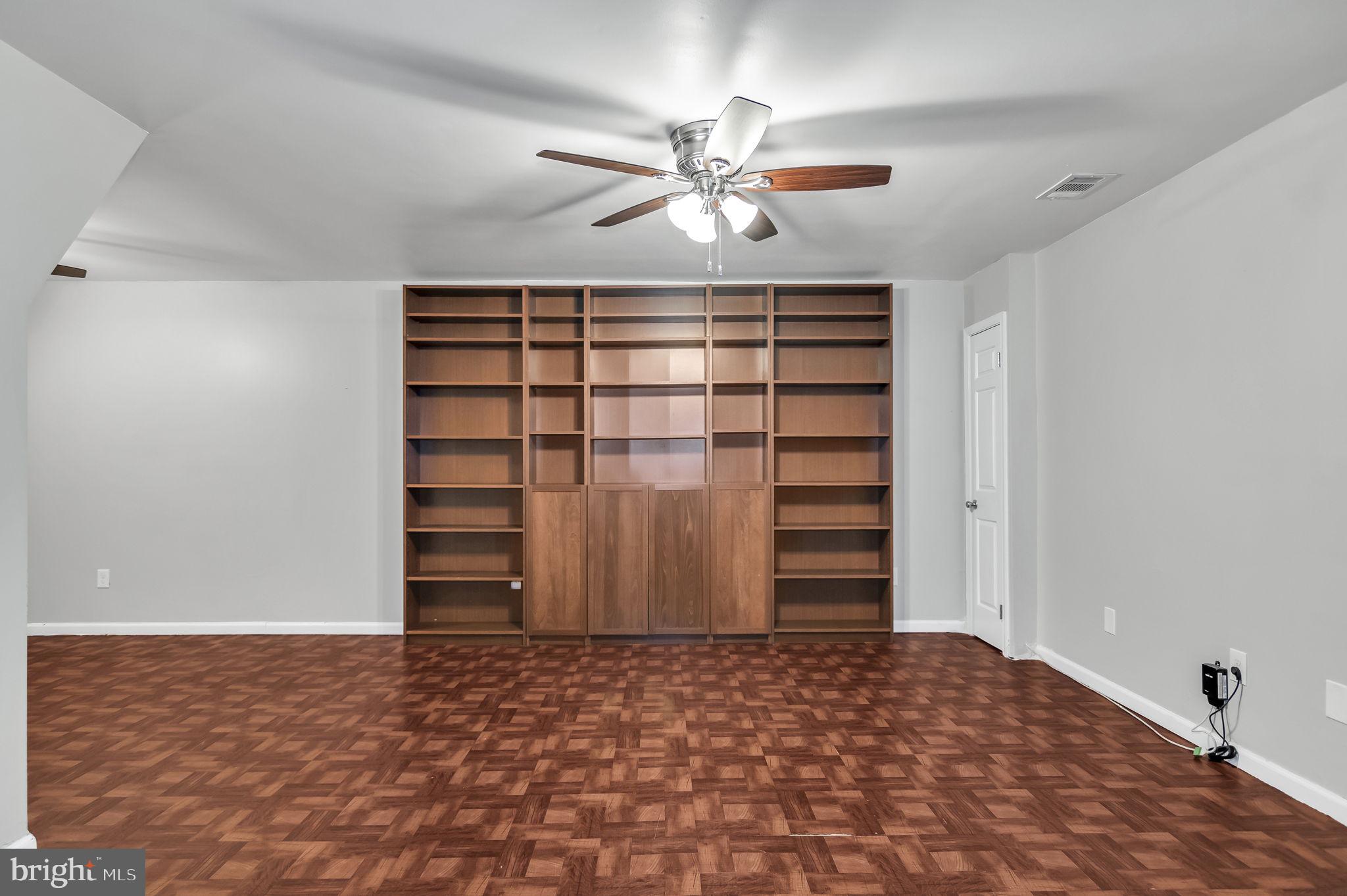 8914 Grandstaff Court Springfield, VA 22153 - Photo 34 of 48 a view of room with closet and stairs