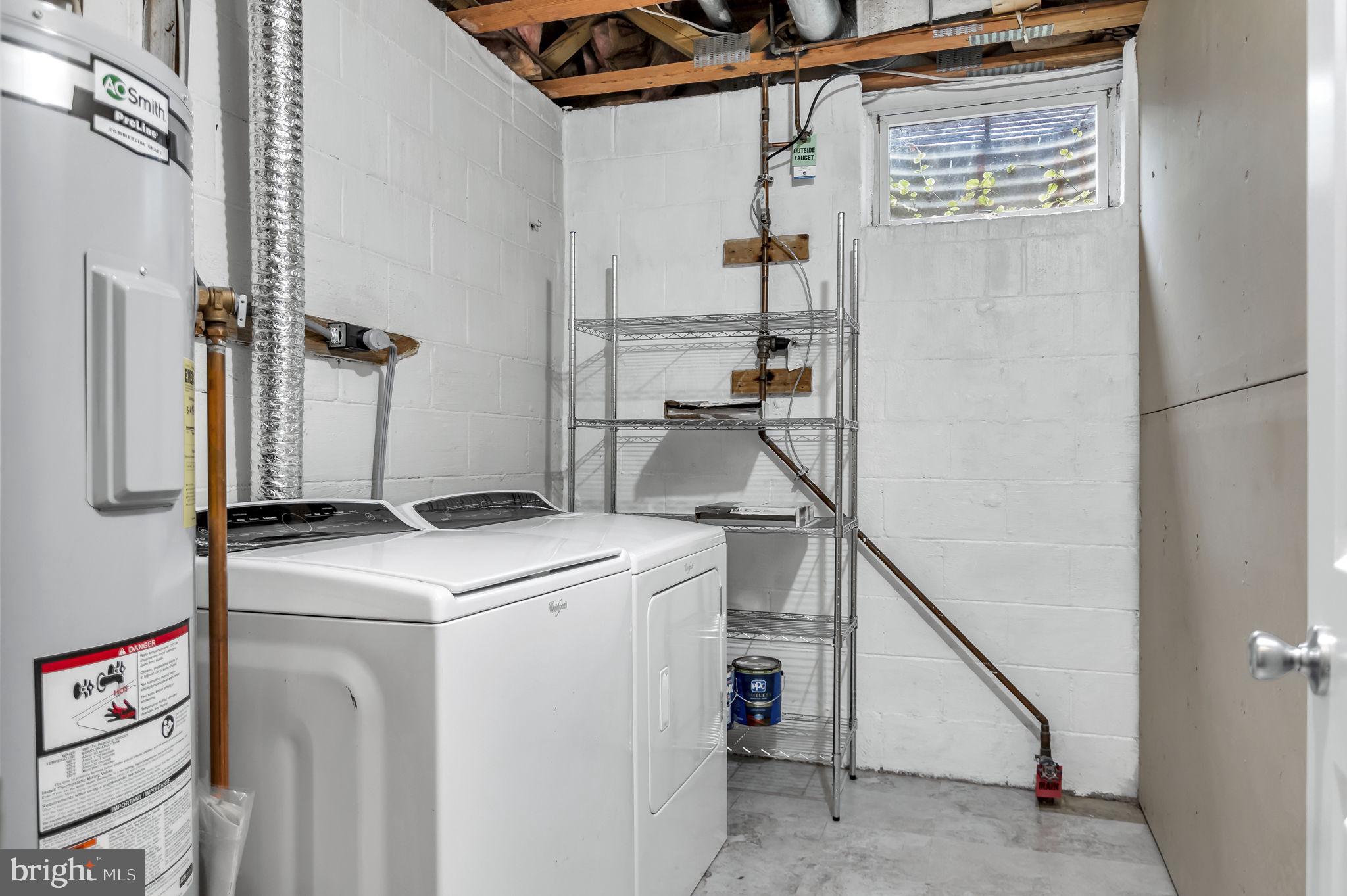 8914 Grandstaff Court Springfield, VA 22153 - Photo 40 of 48 a utility room with dryer and washer