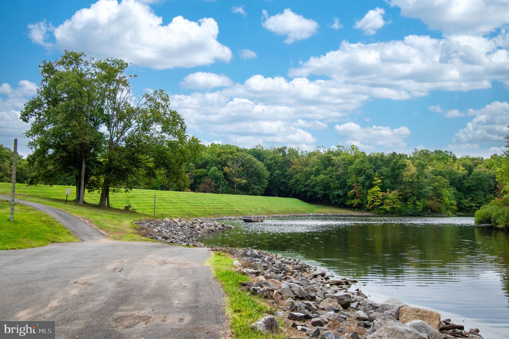 8914 Grandstaff Court Springfield, VA 22153 - Photo 46 of 48 a view of a lake with a yard