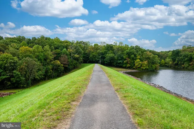 a view of a lake with a big yard