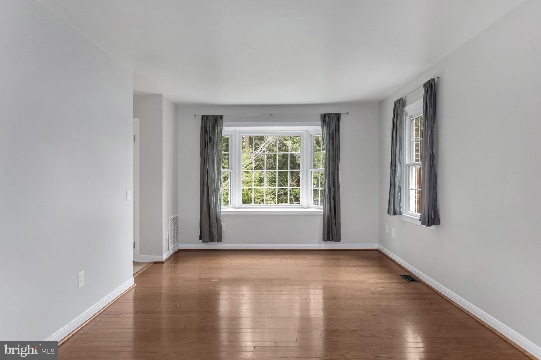 8914 Grandstaff Court Springfield, VA 22153 - Photo 6 of 48 a view of an empty room with glass window and closet area