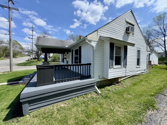 1701 West Jefferson Street Springfield, OH 45506 - Photo 4 of 18 This inviting residence features classic siding and a charming porch, offering comfortable living.