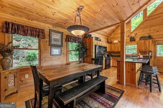 a bathroom with a sink a toilet and shower curtain