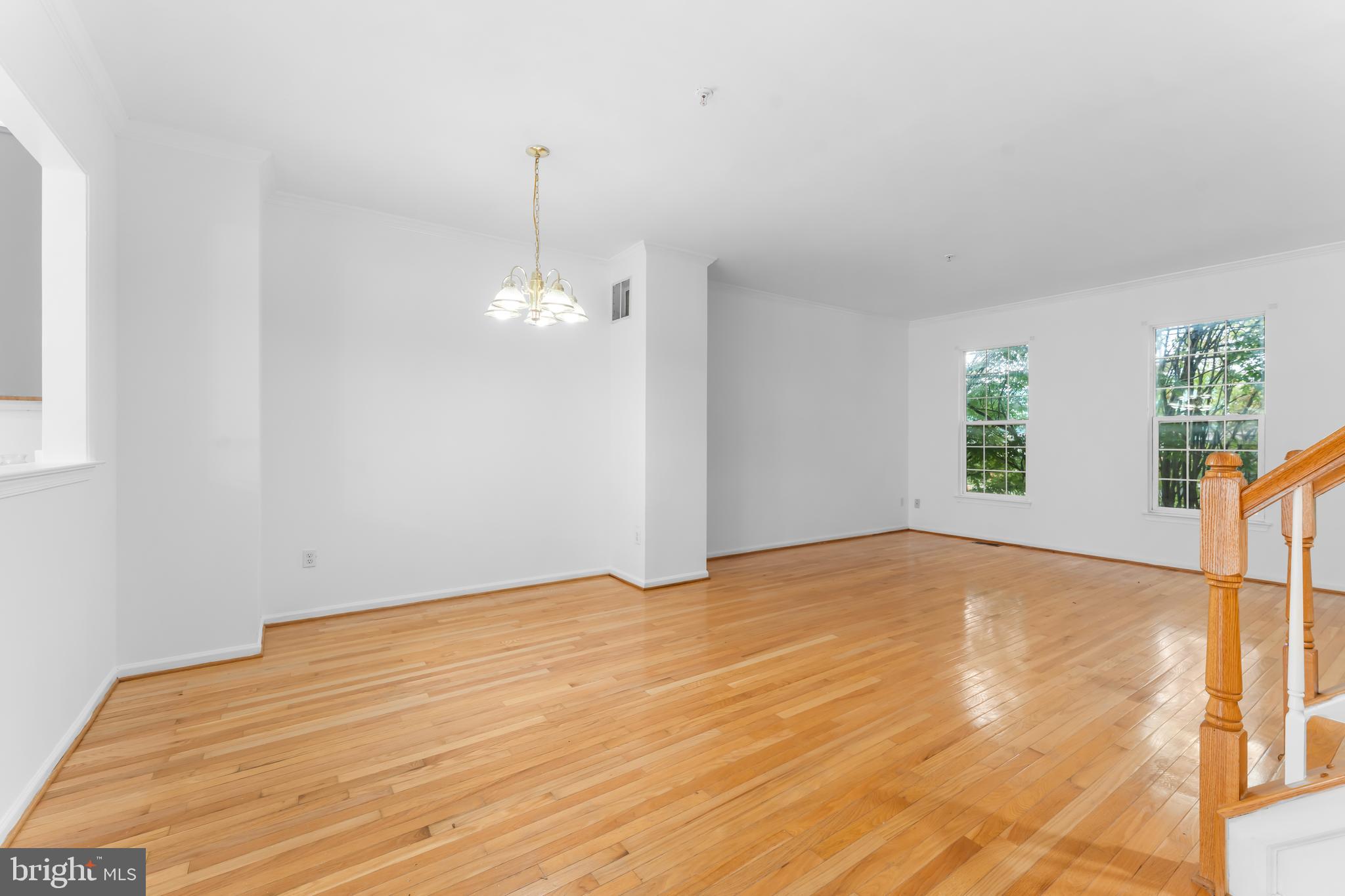 9443 Fields Road Gaithersburg, MD 20878 - Photo 13 of 27 a view of an empty room with windows