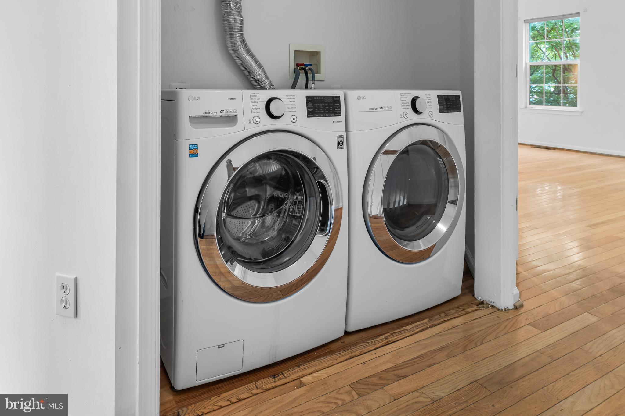 9443 Fields Road Gaithersburg, MD 20878 - Photo 18 of 27 a utility room with dryer and washer