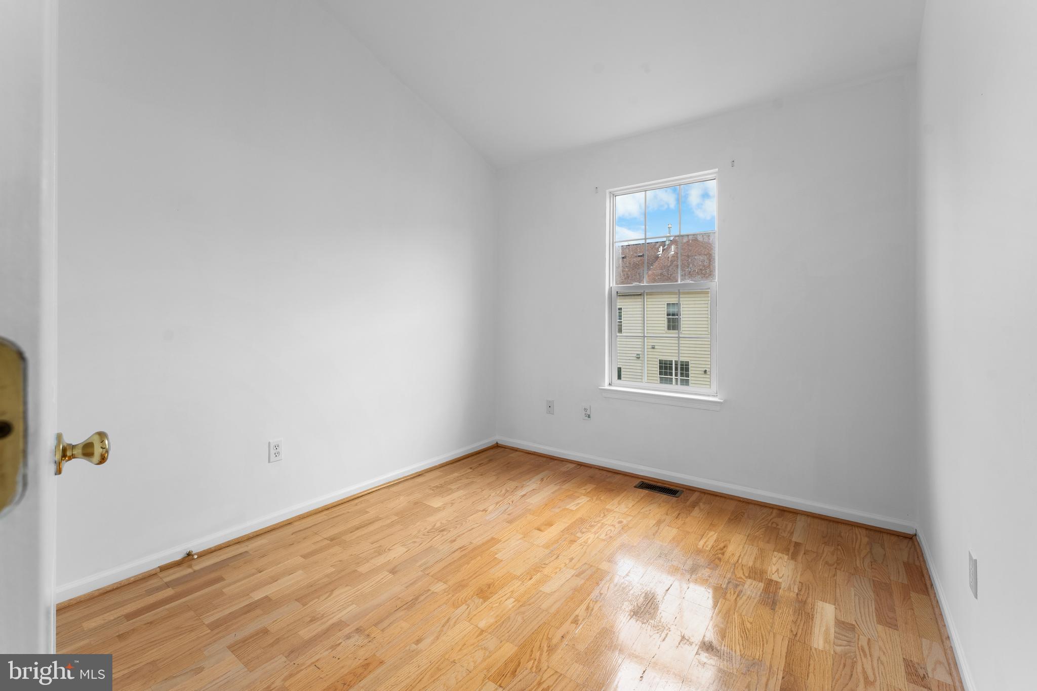 9443 Fields Road Gaithersburg, MD 20878 - Photo 24 of 27 an empty room with a window