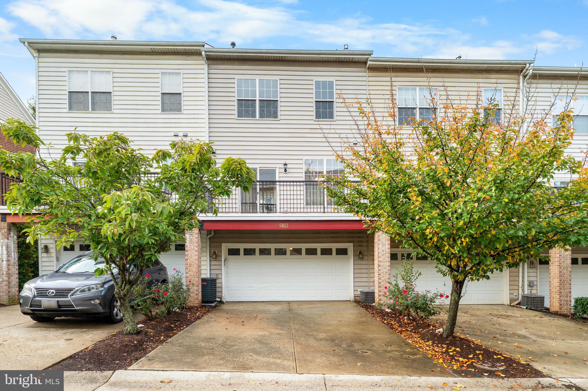 9443 Fields Road Gaithersburg, MD 20878 - Photo 27 of 27 a front view of a house with a garden