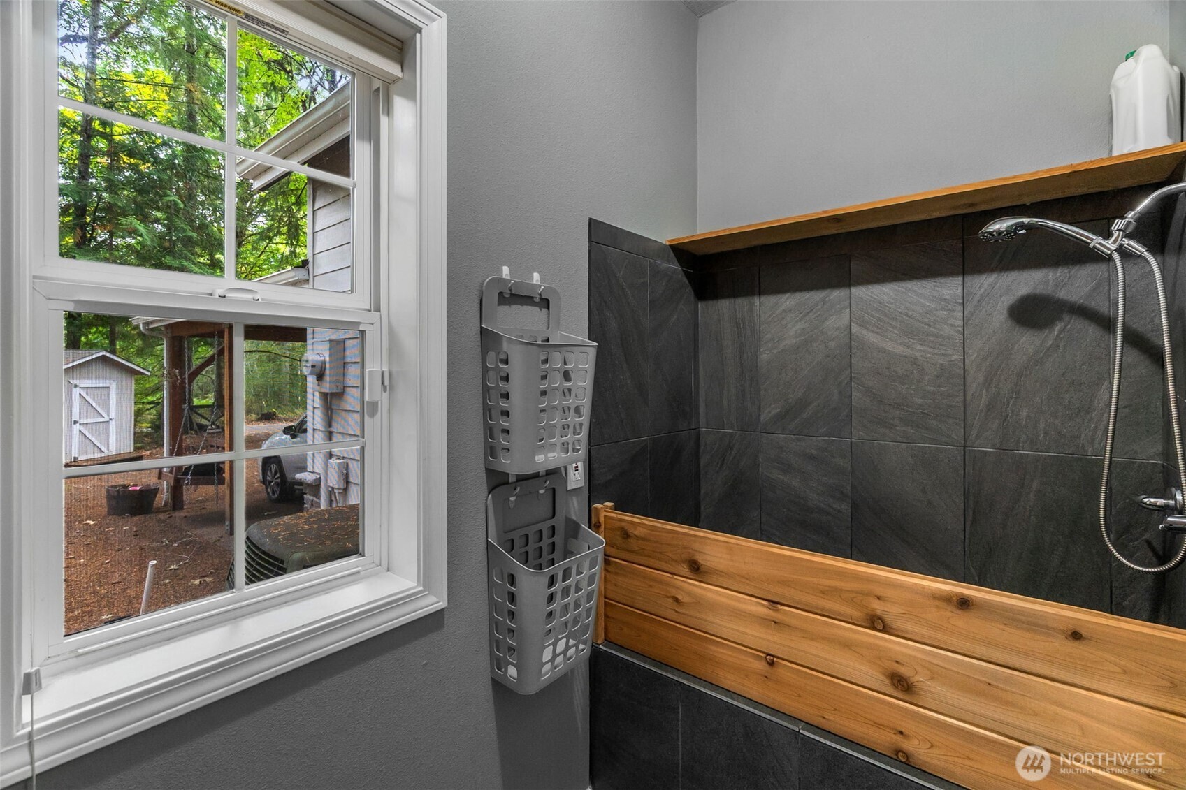 1130 East Sunset Hill Road Shelton, WA 98584 - Photo 22 of 40 a bathroom with a shower and a sink