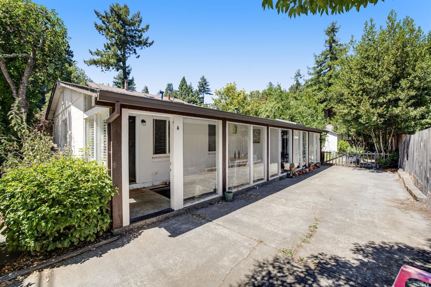 20495 Highway 116 Monte Rio, CA 95462 - Photo 1 of 1 a view of a house with backyard and garden