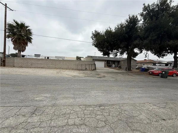 a view of multiple houses with outdoor space
