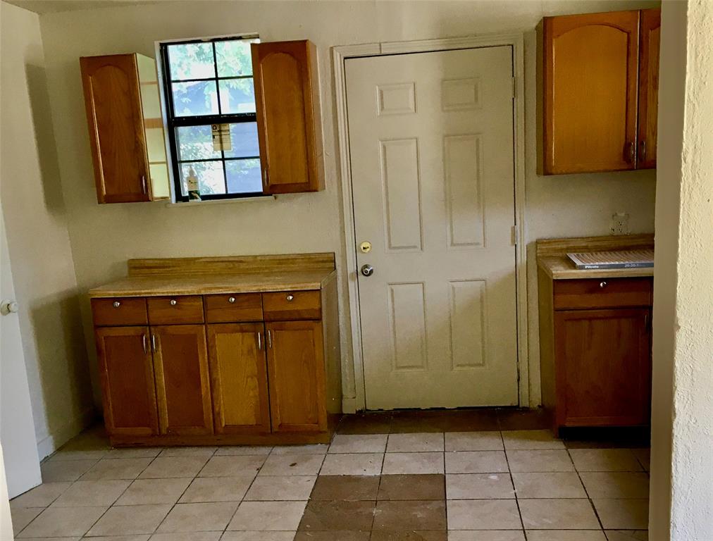 4623 Spring Garden Street Dallas, TX 75215 - Photo 5 of 12 a view of a storage & utility room